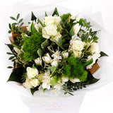 Snowflake Serenity- An arrangement of pristine beauty of white blooms
