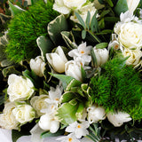Snowflake Serenity- An arrangement of pristine beauty of white blooms