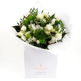 Snowflake Serenity- An arrangement of pristine beauty of white blooms