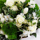 Snowflake Serenity- An arrangement of pristine beauty of white blooms