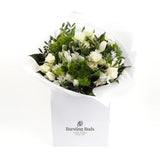 Snowflake Serenity- An arrangement of pristine beauty of white blooms